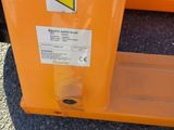 a yellow container with a warning sign on it