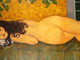 un tableau représentant une femme nue allongée sur un canapé