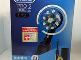 Brosse à dents électrique Oral-B Pro 2 noire avec tête de brosse offerte