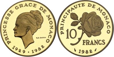 a close up of a coin with a woman ' s face on it