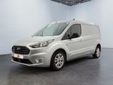 une fourgonnette Ford Transit garée dans une pièce blanche au sol noir
