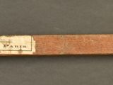 a wooden ruler that is on a table