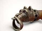 an image of a close up of a ring with a horse ' s head on it