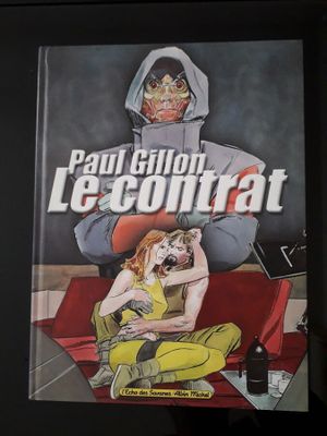 la couverture d'une bande dessinée représentant une femme assise sur un canapé face à un homme