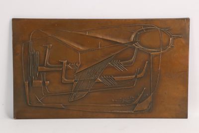 relief of a plane and tools on a brown plaque