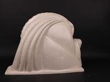 a white sculpture of a woman with a veil on her head