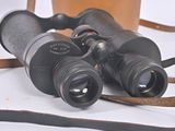 a pair of binoculars that are sitting on a table