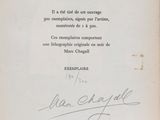 an old black and white photo of a person ' s handwriting on a piece of paper