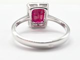 an image of a ring with a pink stone in the center