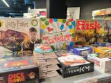 many different games on the table in the store