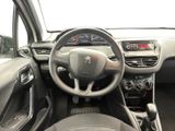 the interior of a car with a steering wheel and dashboard controls