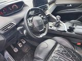 the interior of a car with a steering wheel, dashboard, and dashboard controls