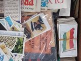 a box full of postcards and other items in it