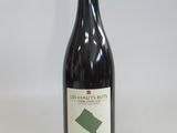 a bottle of wine that is sitting on a table