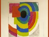 a poster with a picture of a colorful design on it