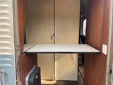 a small table in the back of a camper