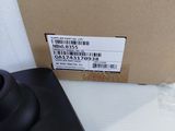 a remote control and a box on the table