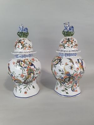 pair of chinese vases with birds and flowers painted on them