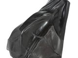 black sculpture of a woman ' s torso on a white background