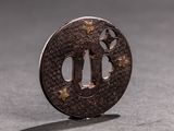 a close up of a small metal object on a table