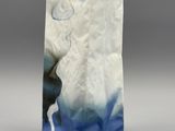 an image of a blue and white vase sitting on top of a table