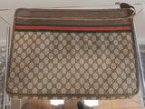 a guccissi bag hanging from the ceiling in the room