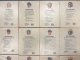 six baseball cards of the same team are on a table