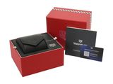 the tag tag wallet is in a red box with a credit card in it