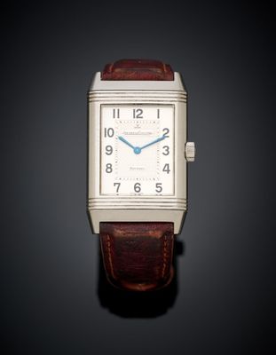 an image of a silver square watch with a brown leather strap