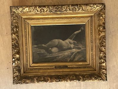 a painting of a nude laying on a bed in a gold frame