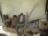 a pile of junk sitting on the floor in a room