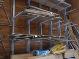 a room that has a bunch of wooden shelves in it