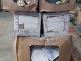 two boxes of clothes sitting on top of each other