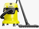 un aspirateur jaune muni d'un tuyau noir sur fond blanc