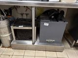 a picture of a kitchen with a lot of items on the floor