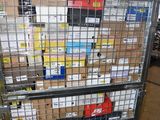 a large metal cart with many boxes on top of it