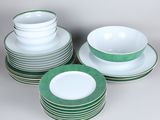 several plates and bowls are stacked on top of each other