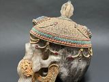 an image of a skull with a hat on it ' s head