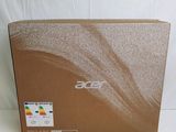 the box of the acer laptop is open and ready to be used