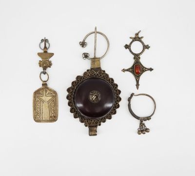 an assortment of various items including a key ring, a bottle opener, and a key chain