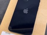an apple iphone is sitting on top of a cardboard box