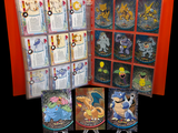 une photo d'un livre sur lequel figurent des personnages de Pokémon