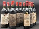 six bouteilles de vin sont alignées sur une table