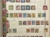 an open book with a bunch of different stamps on it