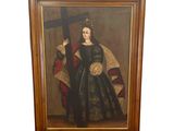un tableau représentant une femme en robe noire tenant une croix