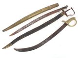 three different types of weapons are displayed on a white surface