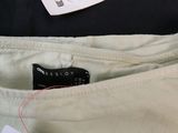 the back of a pair of pants with a tag on it