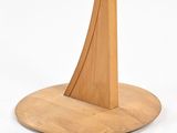 a wooden table with a wooden base and a wooden base