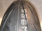 an image of a close up of a motorcycle tire on a table