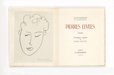 un livre ouvert sur lequel est dessiné le visage d'une femme